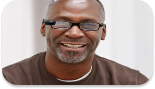 A smiling middle aged individual.